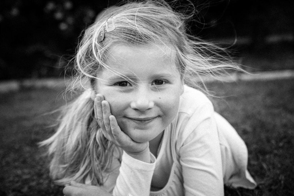 Young child photographed in soft studio light